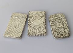 Three Victorian silver card cases with hinged tops, profuse etched decoration by Nathaniel Mills