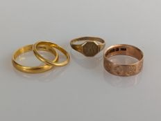 Two 22ct yellow gold wedding band, 3, 2mm, 5.8g and two 9ct gold rings one etched