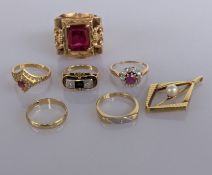 An assortment of five yellow gold gem-set rings, a wedding band and a pearl-set pendant