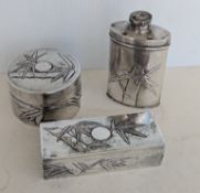 A late 19th century/early 20th century Chinese silver vanity table set with embossed and planished d