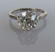 A single stone diamond ring on a platinum setting, the old-cut diamond, eight claw set