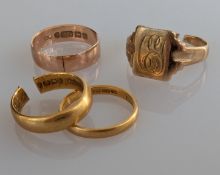 Two 22ct yellow gold wedding bands, 5, 2mm, hallmarked, 6.85g and two 9ct gold rings, 5g (4)