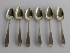 A matching set of six George III silver teaspoons with bright-cut decoration, initialled, hallmarked