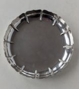 An Irish silver strawberry dish with twelve lobes, 25 cm diameter, hallmarked for William Egan, Cork