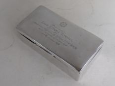 A George V silver wood-lined oblong cigarette box, dedicated to Lieut. H. Nicoll Mitchell 