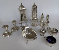A George V silver sauce boat with carved rim on trefid feet, 13 cm W, hallmarked for Adie Brother