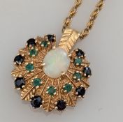 An oval opal and gem-set pendant on a 14ct yellow gold setting, 25mm diameter, 5.7g 