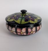 A Moorcroft Violet pattern circular pot and cover, circa 1998, impressed marks to base