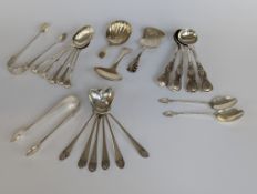 A selection of silver flatware comprising a set of four Victorian king's pattern mustard spoons