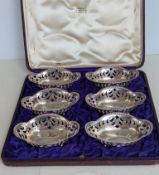 An Edwardian cased set of six Tiffany 925 American silver pierced bonbon dishes