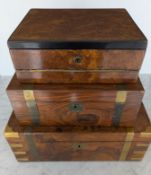 Three early 19th century brass bound writing slopes with fitted interiors, one with some brass lift
