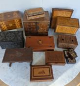 A collection of eleven ornate boxes, carved and inlaid, mixed woods, some with lined interiors