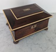 A Regency rosewood sarcophagus-shape ladies work box with ring handles, the interior revealing an ar