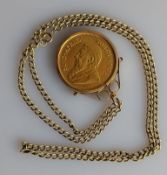 A 1974 gold Krugerrand on a 9ct gold mount and chain, 50.2g