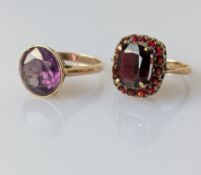 A vintage round-cut alexandrite dress ring in a 9ct yellow gold basket setting and