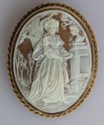 An oval gold-framed cameo brooch, hallmarked 9ct, 55 x 45mm, 15.6g