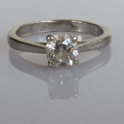 A diamond solitaire ring on a platinum claw setting, the octagonal-cut diamond approximately 0.50 