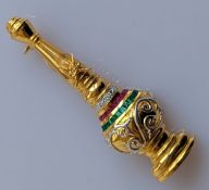 A yellow gold brooch in the form of a water dropper depicting the Oman coat of arms with diamond