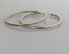 A pair of white gold and diamond decoration hoop earrings, hallmarked 18ct, 11.6g