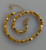 A yellow gold fancy-link necklace, 47 cm, with hallmark for 21ct gold, 40g