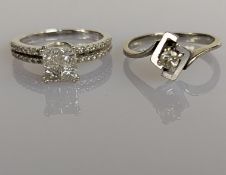 A diamond ring, the four square-cut diamonds in an 18ct white gold claw setting, 6 x 6mm, with diamo