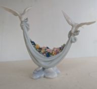A boxed Lladro figurine 'Petals of Peace' 06579, in very good condition