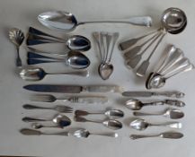 A George III silver fiddle pattern basting spoon, 29.5 cm, 1810 and two silver sauce ladles, 17 cm