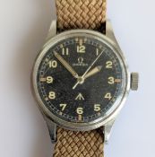 A gentleman's stainless steel military Omega wristwatch dated 1953 with original 