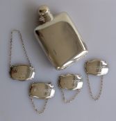An Edwardian silver hip flask with hinged screw top, 12 x 7.5 cm, hallmarked for James Dixon & Sons