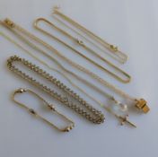 Three yellow gold pendant chains, a belcher chain, two other neck chains, one broken