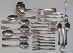 An assortment of Georgian and Victorian silver flatware to include an old english pattern soup ladle