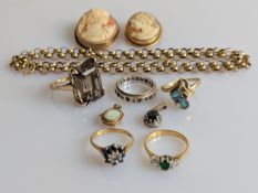 A sapphire and diamond cluster ring and an emerald and diamond ring, both on 18ct yellow gold 