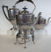 An Edwardian silver tea and coffee service, matching kettle-on-stand/burner with half-fluted decorat
