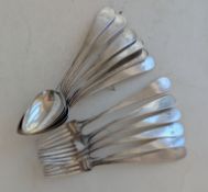 A set of six large Georgian forks and six similar spoons, all 21.5 cm, in old English style