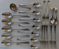 A pair of George V silver large forks, 20 cm; five rat tail table spoons with dog nose bowls, 21 cm