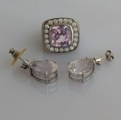 A tourmaline and pave-set diamond dress ring with matching earrings on an white gold setting