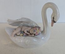 A Lladro figure group of a baby asleep on a swan 'Drifting through Dreamland' in original box, 16.5 