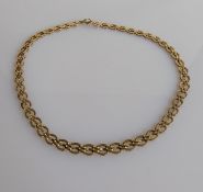 A yellow gold fancy-link necklace on a lobster clasp, 38 cm, hallmarked 9ct, 11.3g