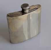 A QEII silver hip flask with bayonet screw top, hallmarked for Asprey & Co, Birmingham, 1979, 11 h x
