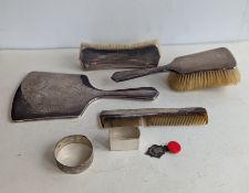A George V silver-backed brush set and mirror with etched festoon decoration, hallmarked for Henry