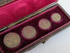 A cased 1888 Maundy coin set including fourpence, threepence, twopence and one pence, contained in