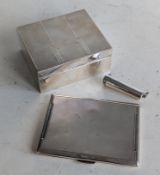 An Art Deco silver cigarette case with engine-turned design, 11.5 x 8.5 cm, hallmarked for Smith & B