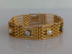 A yellow gold gate-link bracelet with pearl and diamond collet-set decoration
