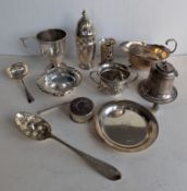 An assortment of Edwardian and later silver items to include a two-handled cup by C S Harris & Sons 