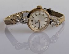 A mid-century ladies Certina dress wristwatch with baton markers in a 9ct yellow gold case