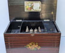 A late 19th century musical rosewood box with marquetry inlaid decoration, 8 airs as listed, cylinde