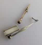 A 1940s silver bookmark from Asprey, 7.5cm, with patent number 257529 and a white metal bridge penci
