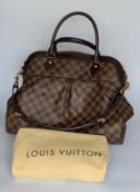 A Louis Vuitton Trevi GM Damier Ebene canvas bag with brown leather top handles, piping, removable