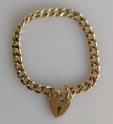 A yellow gold flat curb-link bracelet with heart clasp, hallmarked 9ct, 15 cm, 17g