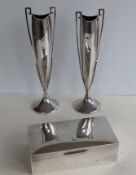 A pair of weighted George V silver vases, each with side handles on a spreading foot, 25 cm H,